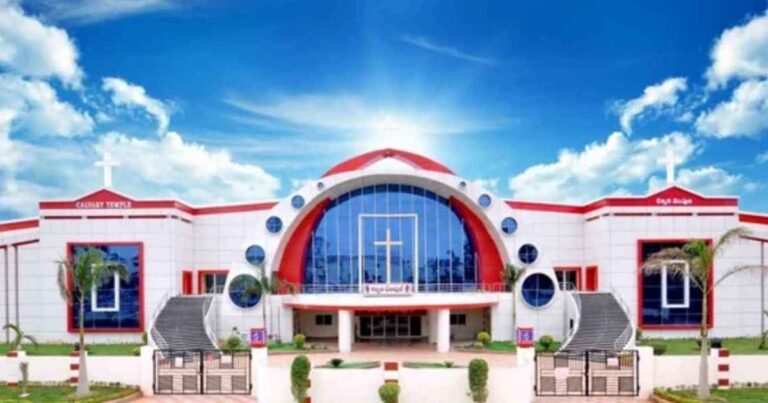 Calvary Temple Hyderabad church exterior with visitors during Sunday service hours